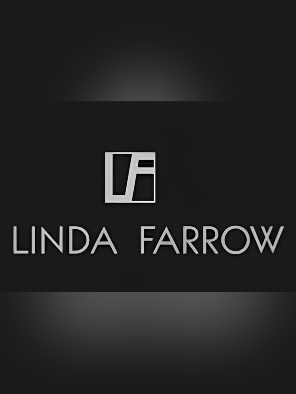 Linda Farrow Silver Logo on Black Panel